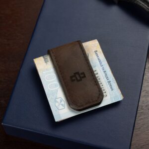 Side angle of the brown leather Belvoir money clip, showing its slim and compact profile for effortless carrying.