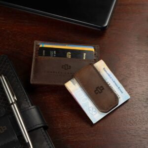 Luxurious rich brown leather money clip displayed in a premium setting, emphasizing its strong magnetic clasp and refined craftsmanship.